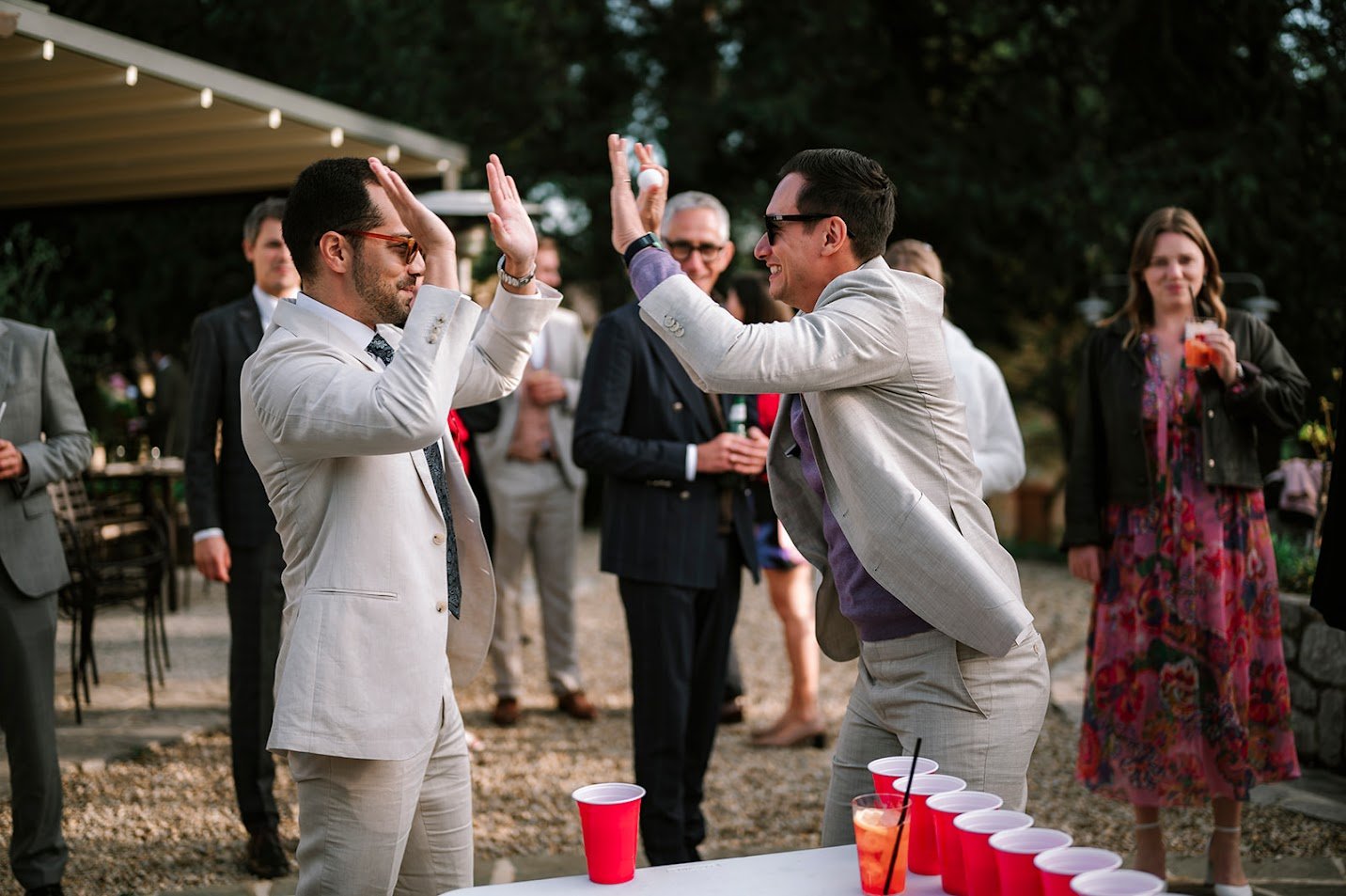 wedding photo Tuscany Italy reception ping pong game